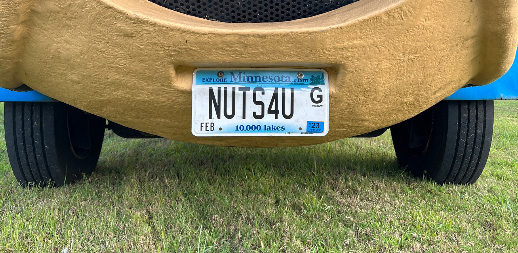 A closeup of the Nutmobile’s front bumper that shows a license plate reading NUTS4U